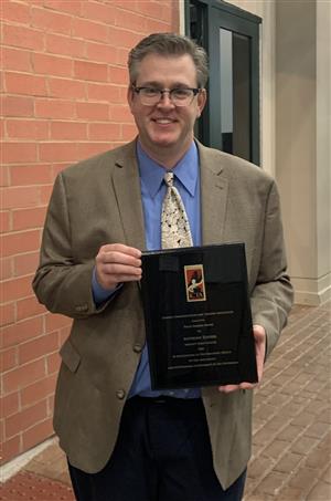 Anthony Zoubek with his award 